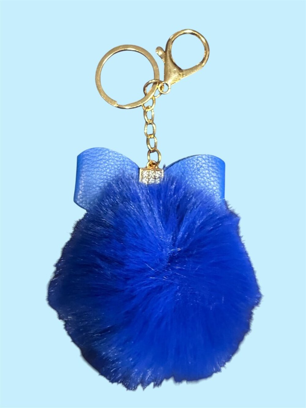 POM POM IN ROYAL BLUE KEY CHAIN BAG CHARM